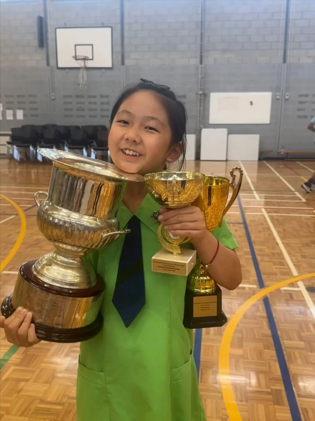 Student tournament trophy moment